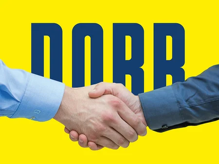 Photo: Handshake of two hands behind the PORR logo